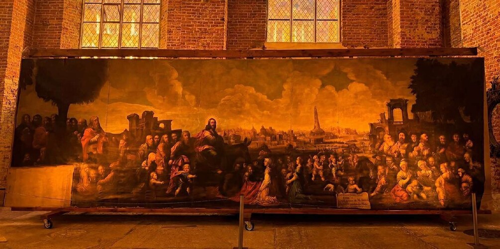 A large mural depicting a historical scene with figures and architecture. 4