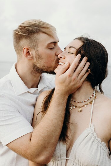 A couple embracing outdoors. 1