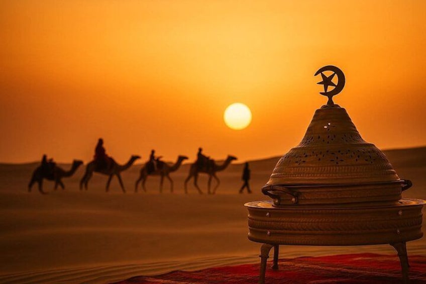 A desert landscape with a group of camels and riders silhouetted against a sunset. 2