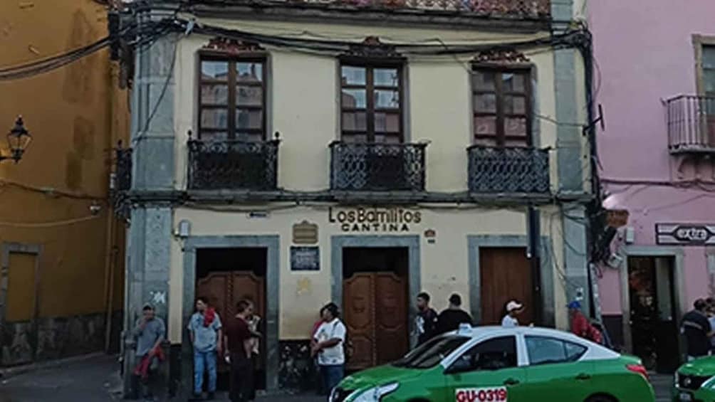 A street scene with a building labeled 'LosBamilos Cantina'. 2