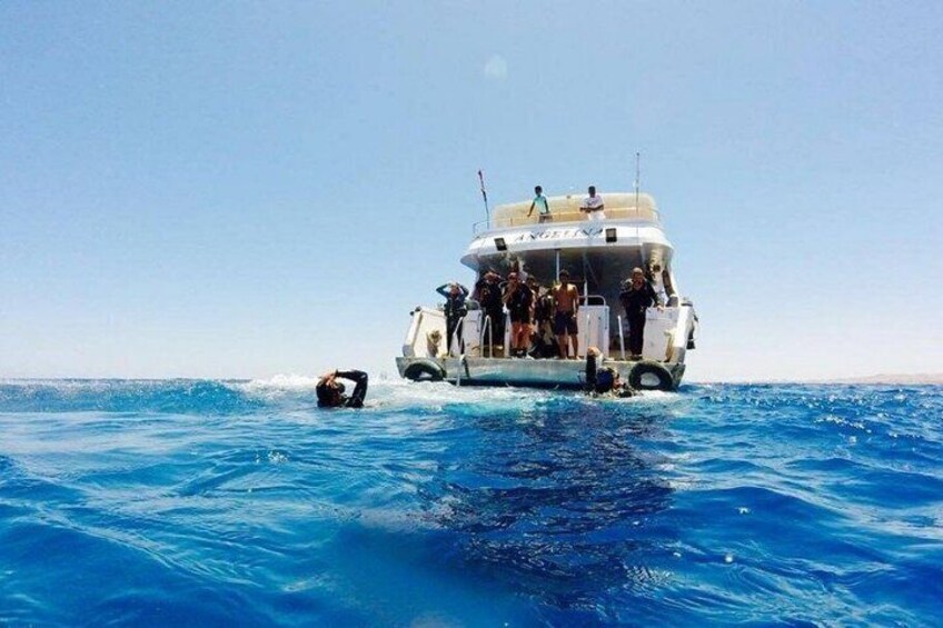 A boat with people on the water. 2