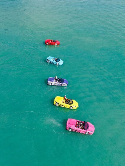 Five toy cars on water. 3