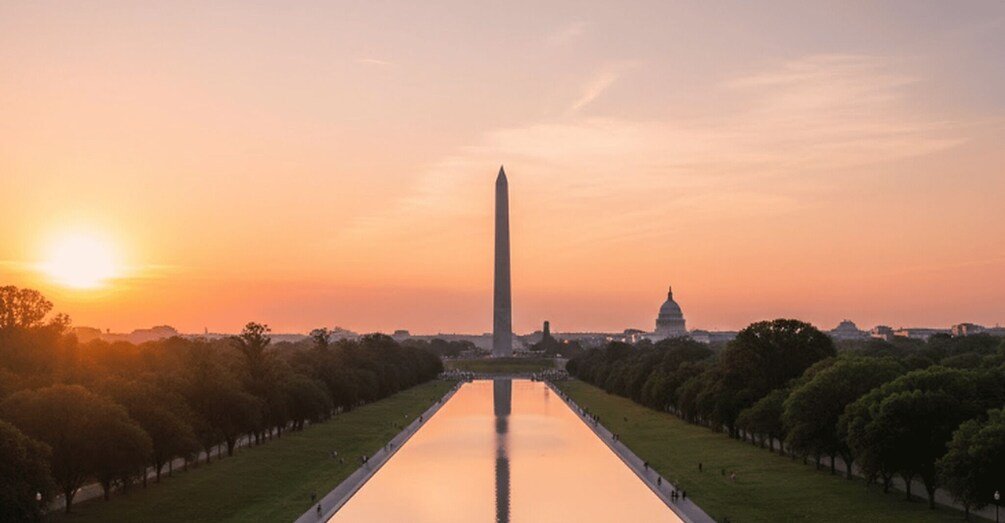 The Washington Monument with the Capitol building in the background during sunset. 2