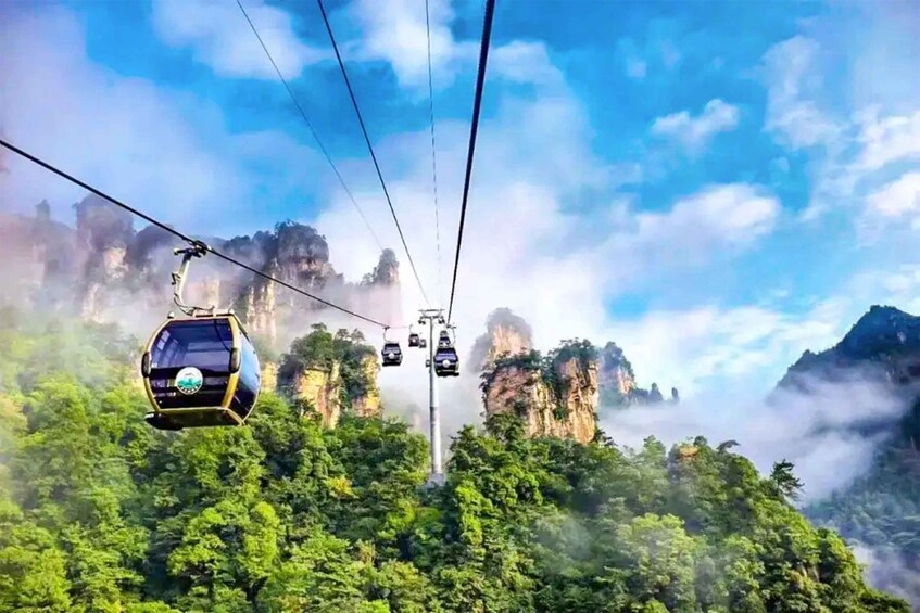 A cable car system with a mountainous landscape in the background. 4