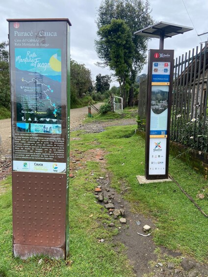 Informational signs for Purace-Cauca, including a map and details about Ruta Montaña de Fuego. 4