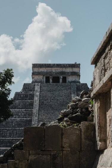 A stone pyramid with a flat top and a small entrance. 3