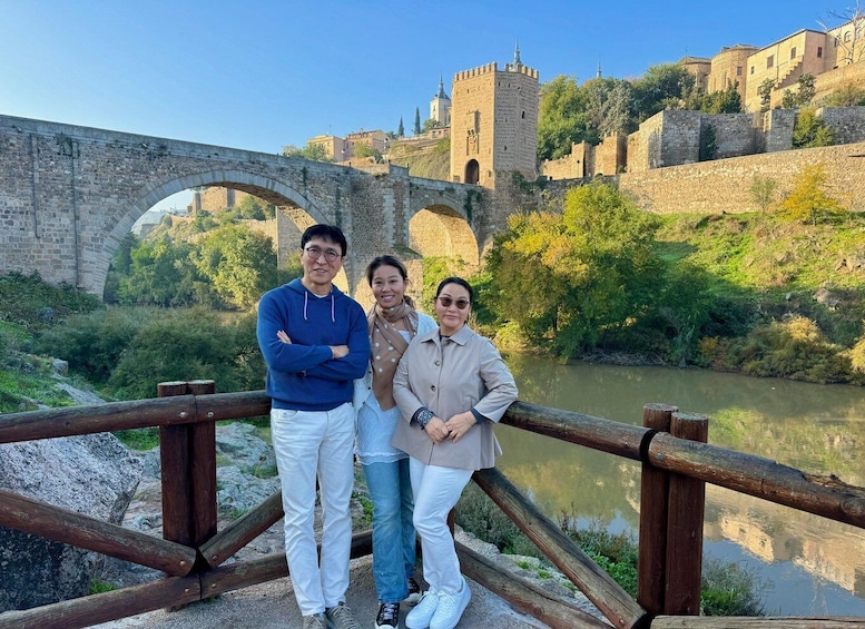 A stone bridge, a castle, and a river. 1