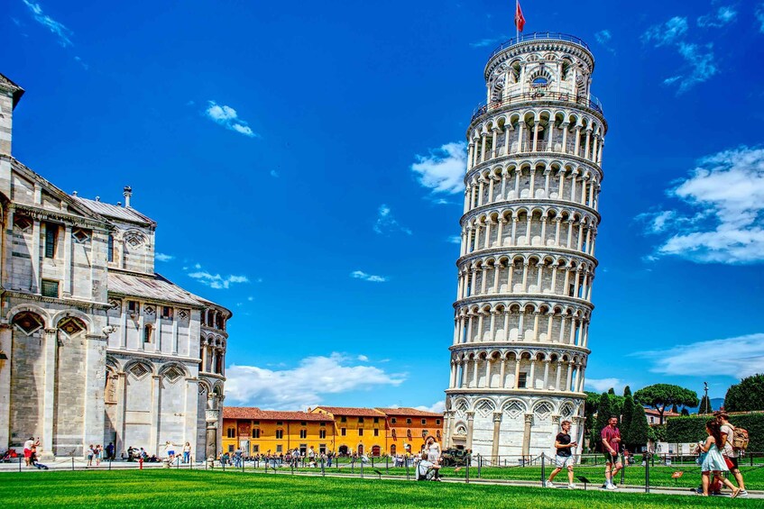 The Leaning Tower of Pisa with tourists in the foreground. 1