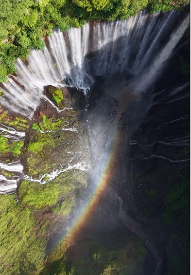 A waterfall with a rainbow. 2