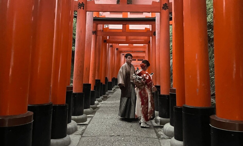 A pathway flanked by red torii gates. 5