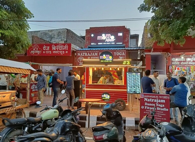 A street with a yoga and fitness studio named Natrajam. 3