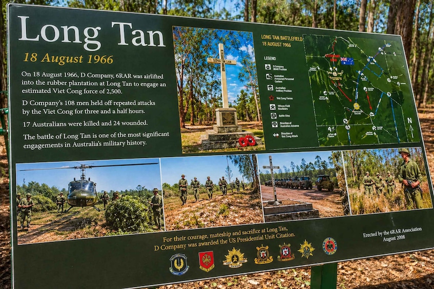 A historical sign about the Battle of Long Tan, 1966, with photos and a map. 3