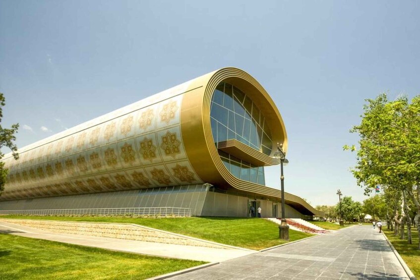 A modern building with a curved facade and large windows. 2