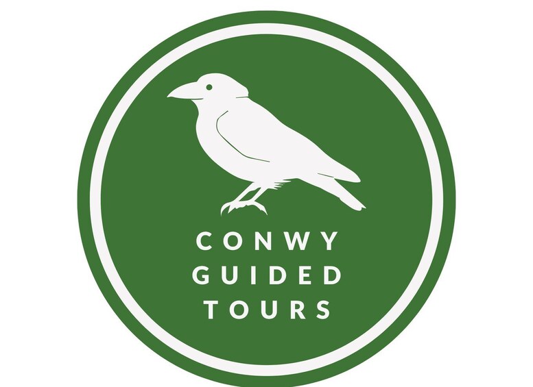 A logo with a bird and the text 'CONWY GUIDED TOURS'. 2