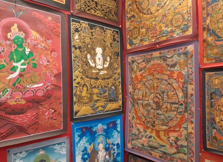 A collection of colorful religious paintings. 4