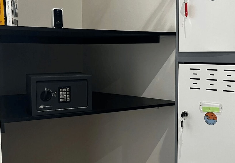 A security keypad and a safe with a key lock. 5