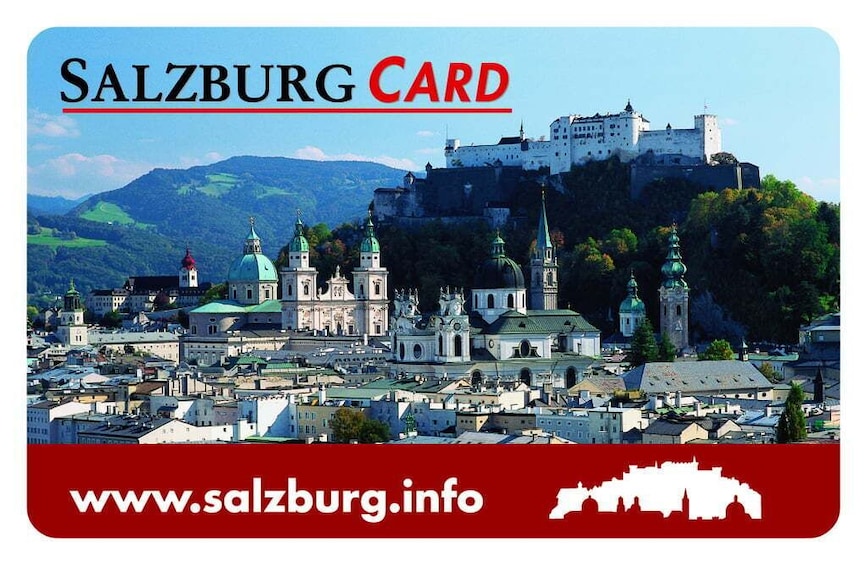 A cityscape with historic buildings and a castle on a hill. 2