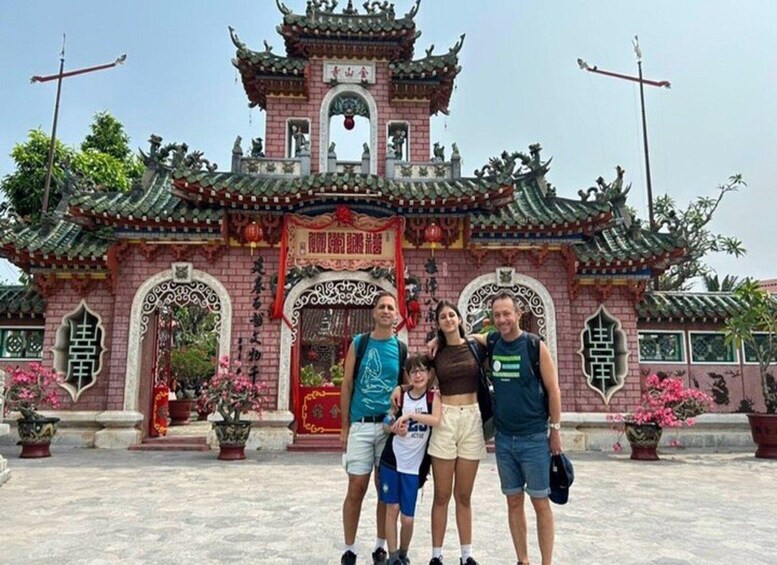 A traditional Chinese temple with ornate architecture, including a multi-tiered roof and intricate decorations. 3