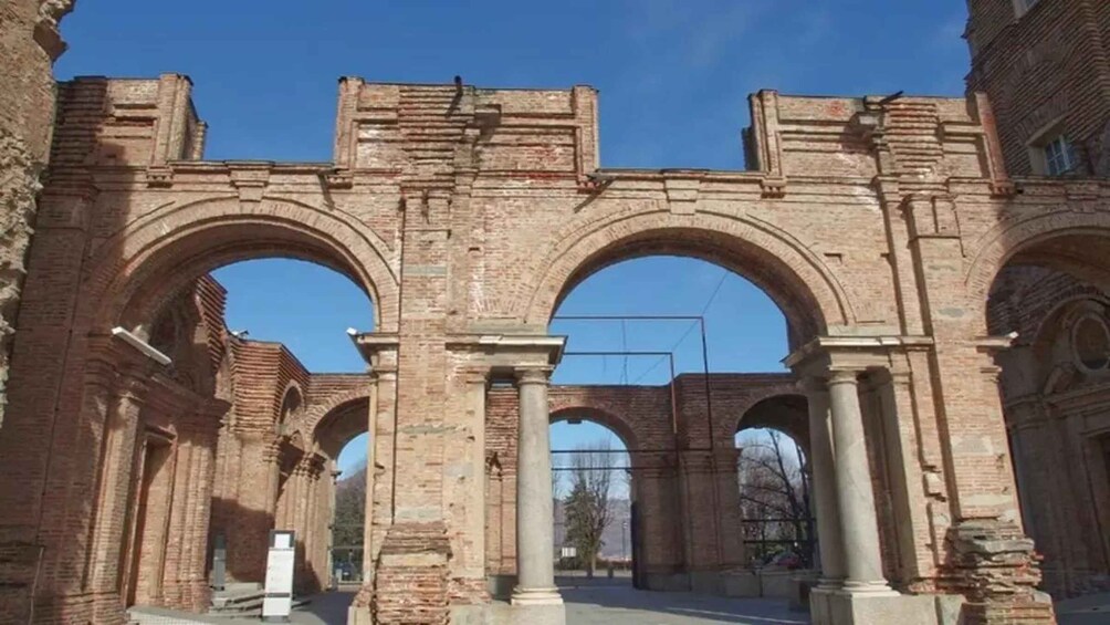 Ancient brick arches with columns, likely part of a historical site. 3