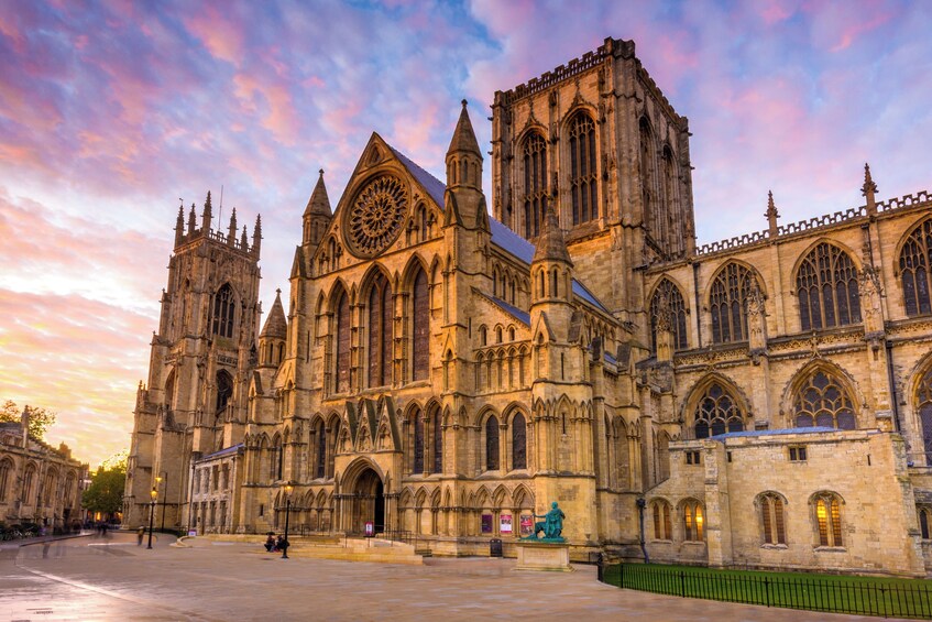 A large Gothic cathedral with intricate architecture and a rose window. 3