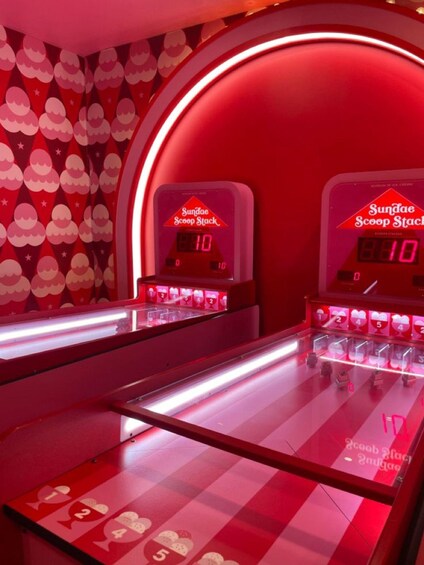 A dessert display with two 'Sundae Scoop Stacks' machines, each displaying a score of 10. 2