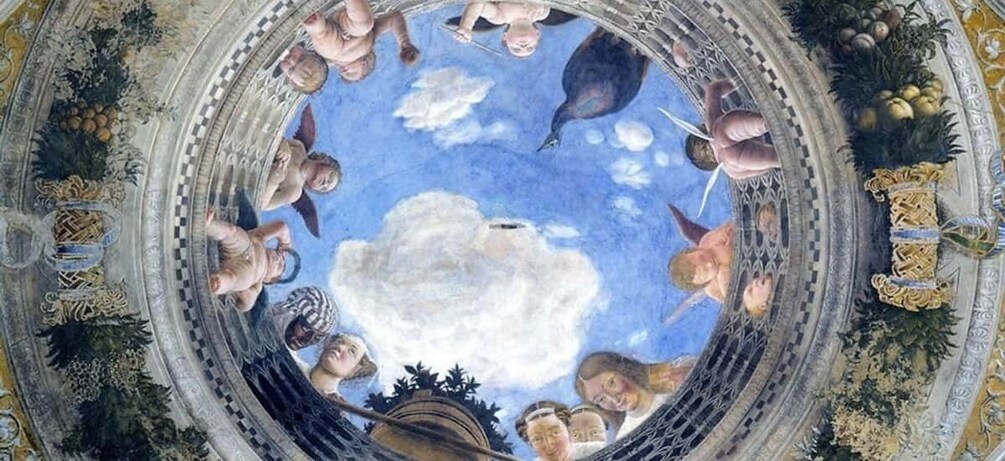A circular fresco with cherubs and clouds on a domed ceiling. 1