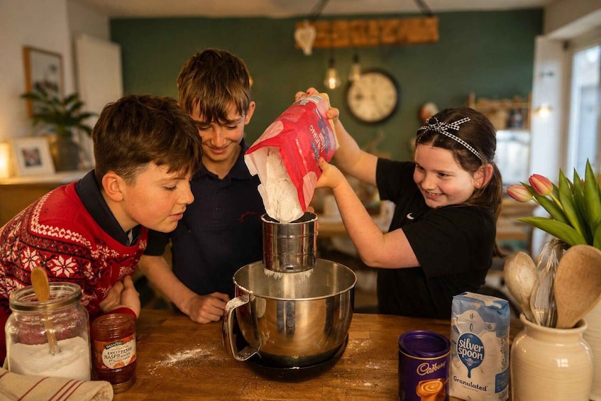 A person pouring flour into a mixing bowl. 4