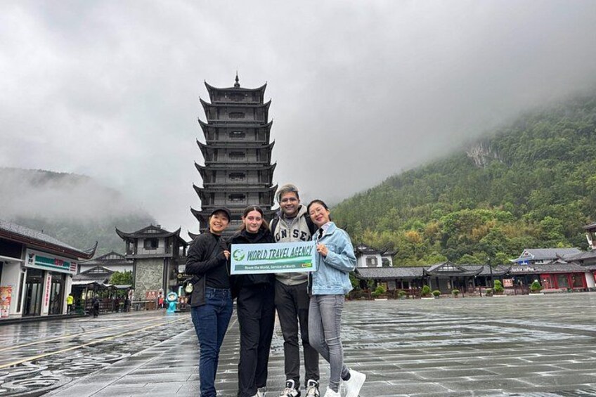 A pagoda-style building, a group of people, and a sign with 'WORLD TRAVELERS CLUB' text. 4