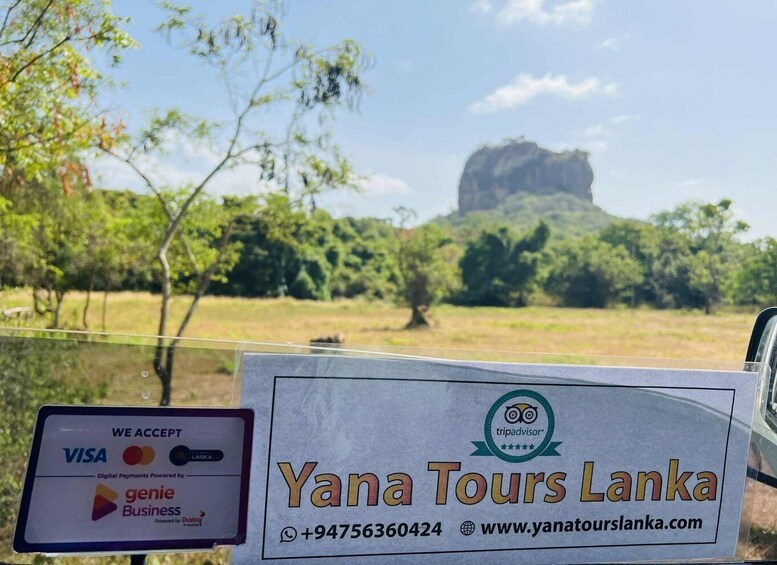 A signboard for Yana Tours Lanka with contact information and payment acceptance logos. 4