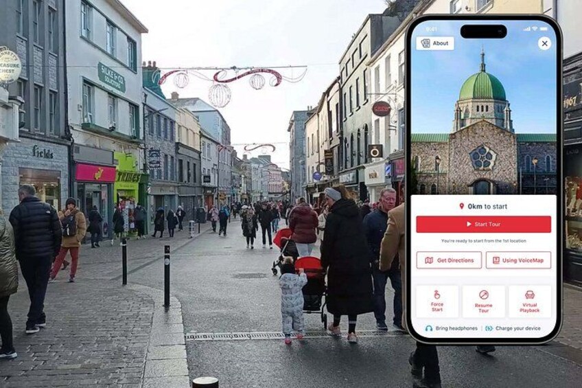 A smartphone displaying a map application with a 'Start Tour' button, a street with pedestrians, and buildings with various storefronts. 1