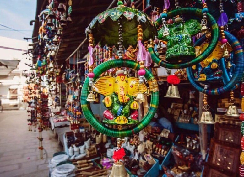 A market stall with colorful jewelry and decorative items. 3