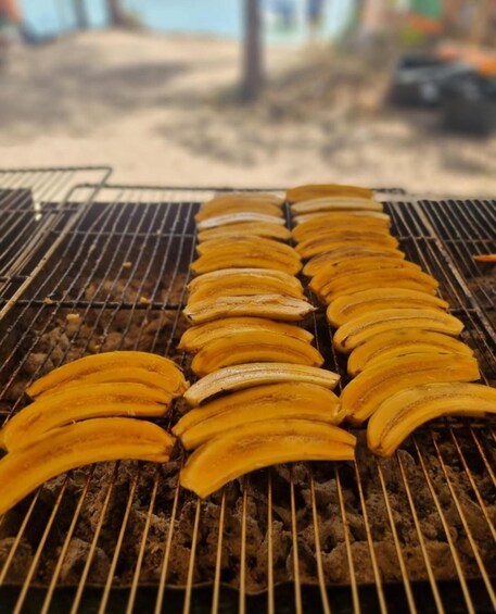 Banana slices grilled on a barbecue. 2