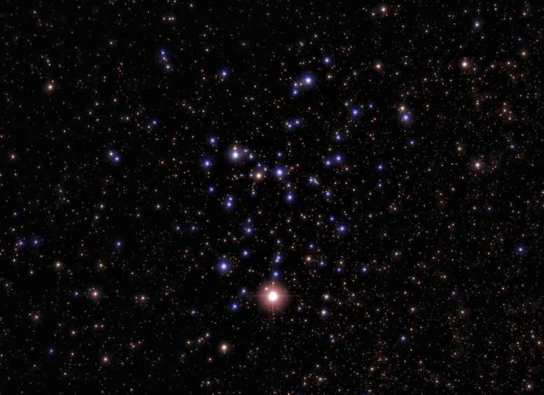 A starry night sky with numerous visible stars and a few bright celestial objects. 3