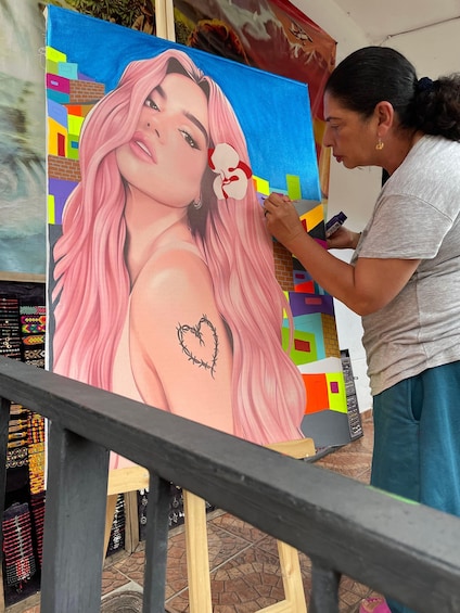 An artist painting a portrait on a canvas. 4