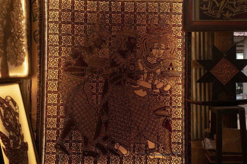 A detailed tapestry with intricate patterns and figures. 4