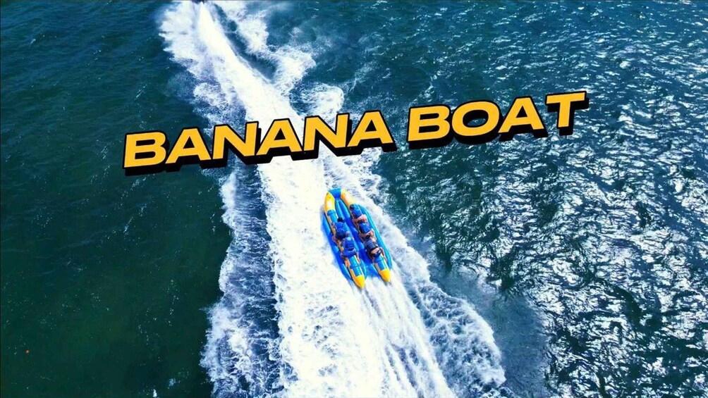A banana boat speeding across the water. 2