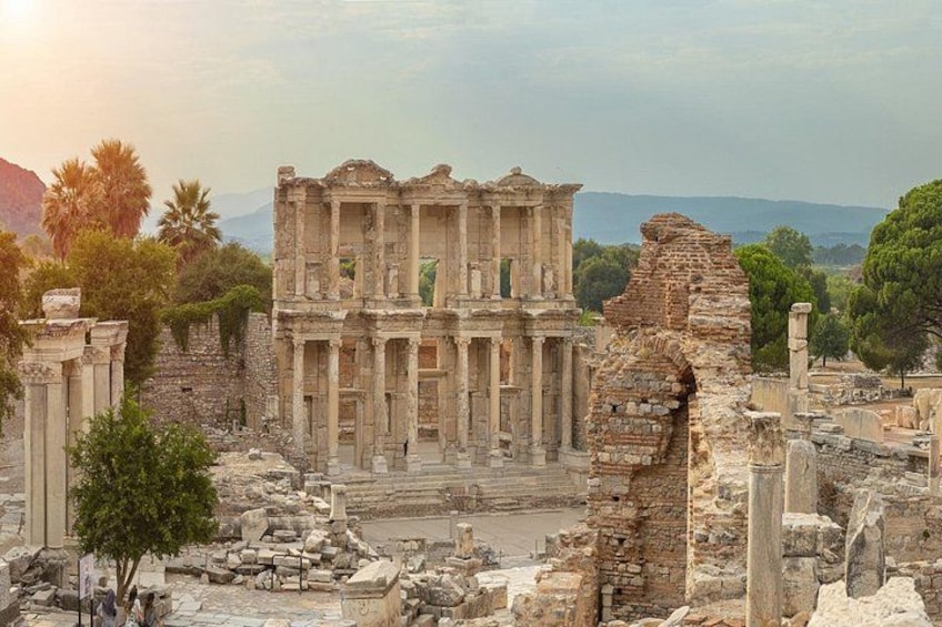 Ancient ruins with columns and a partially intact structure. 2