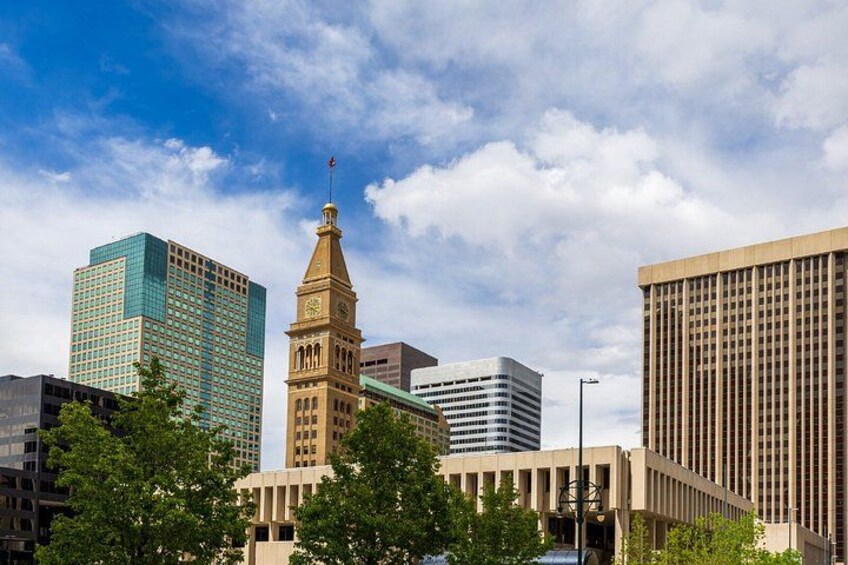 Daniels & Fisher Tower: The iconic Clock Tower, a historical record of the city standing proudly amid contemporary buildings. 3