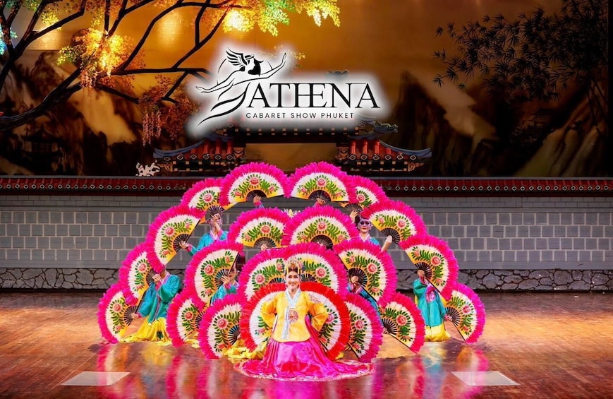 A traditional dance performance with colorful fans and costumes. 1