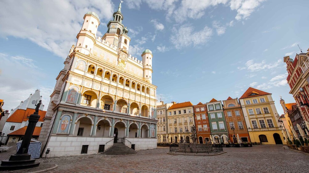 A historic building with ornate architecture and a courtyard. 1
