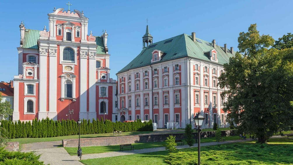 A historic building with a clock tower and a large, ornate facade. 3