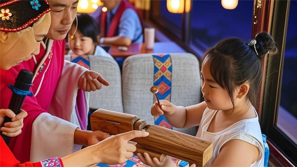 A person in traditional attire handing a wooden box to a child on a bus. 5