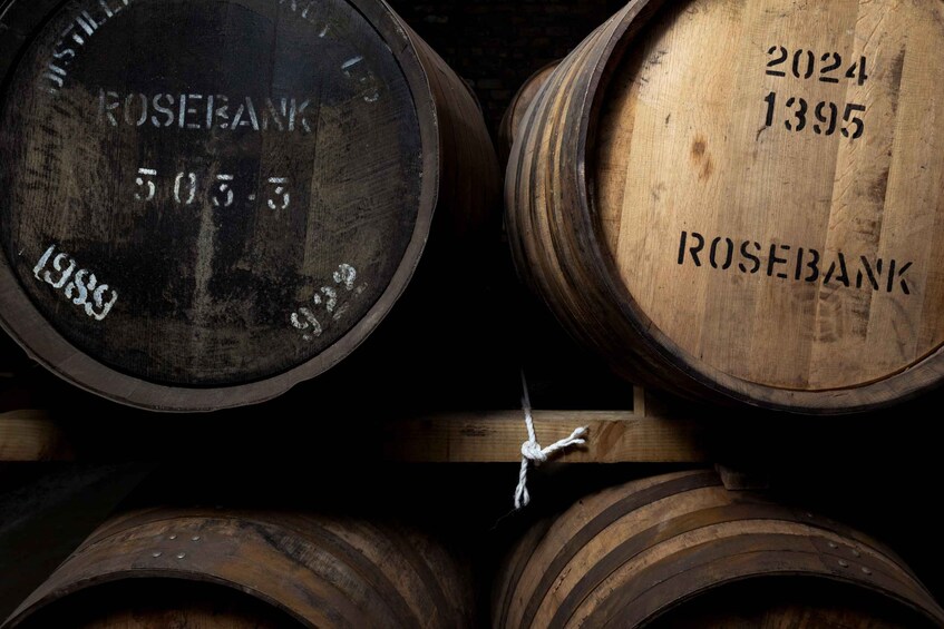 Two wooden barrels with the text 'ROSEBANK' and '2024 1395' on them. 2