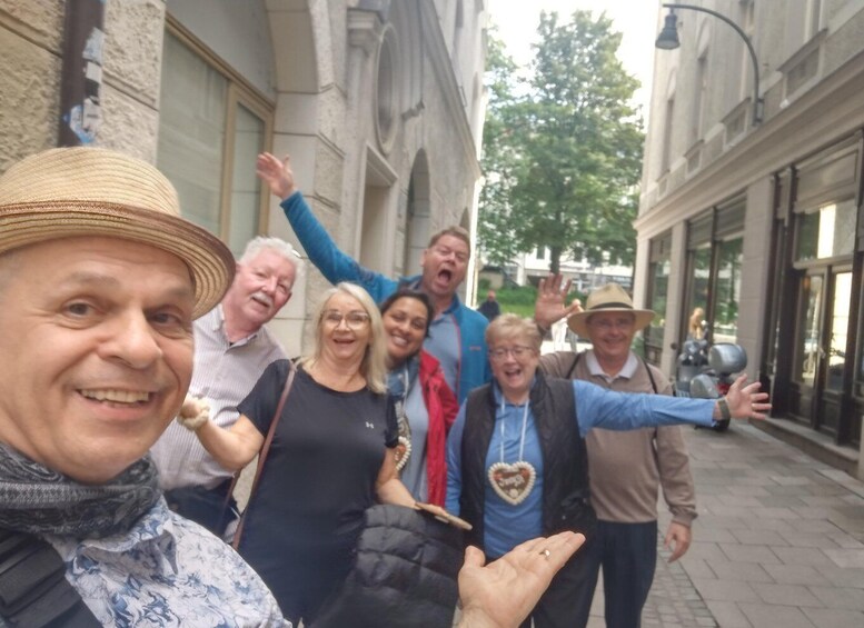 A group of people standing on a city street. 3