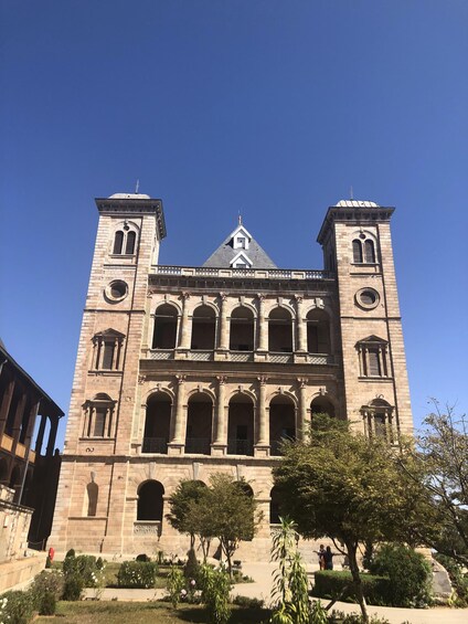 A large stone cathedral with multiple arches and towers. 3
