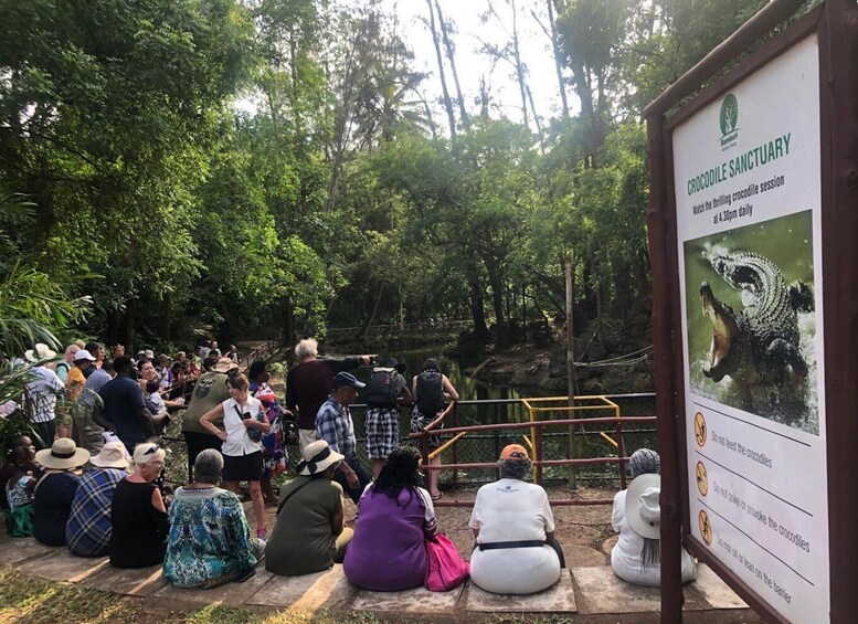 A group of people observing crocodiles at the Crocodile Sanctuary. 3