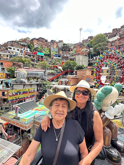 A bustling urban scene with a colorful amusement ride and a vibrant market area. 4