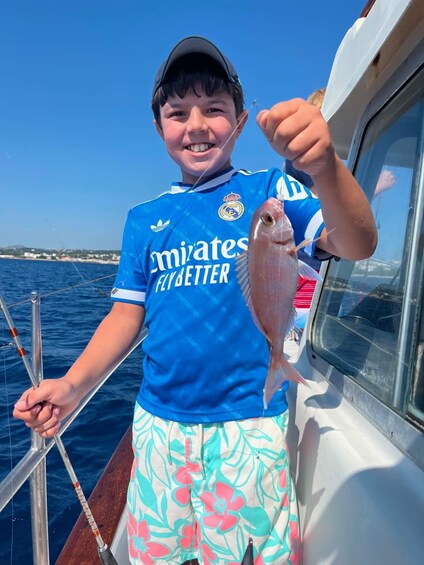 Picture 30 for Activity Rhodes: Captain Manolis Fishing Trip with BBQ and Swimming 4
