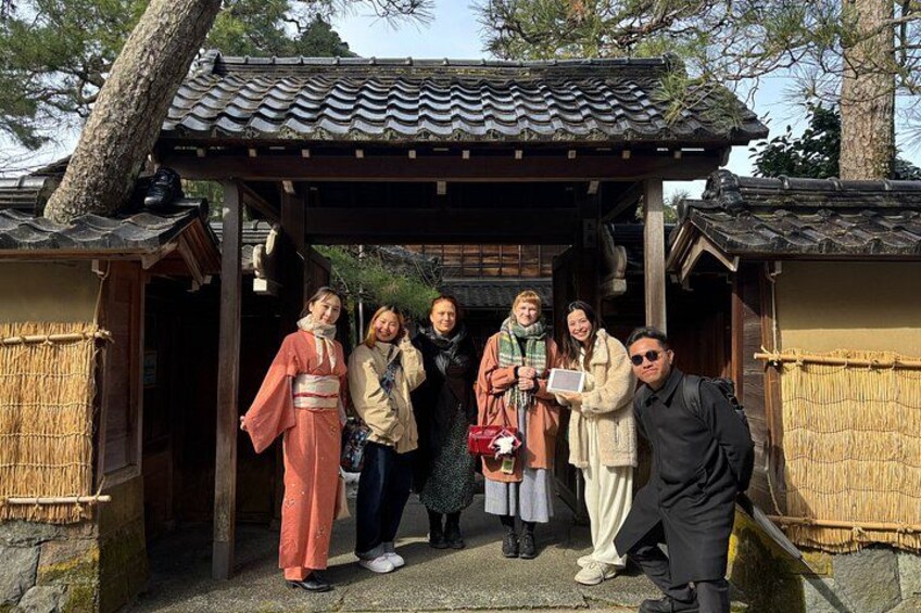 A traditional Japanese building with a tiled roof and wooden structure. 3