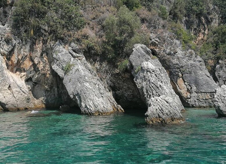 A rocky coastline with clear turquoise water. 4